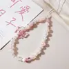 Nuevo Lanyard para Teléfono Móvil Corazón de Fresa Cadena de Perlas con Lazo Fresco Creativo Colgante para Funda de Teléfono Móvil Juego de Cuatro Piezas