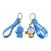 Novo chaveiro de borracha macia em PVC, personalizável, apresentando uma figura azul fofa e rechonchuda em 3D, perfeito como chaveiro de carro ou pequeno acessório para bolsas