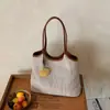 Bolsa versátil de verano para vacaciones casuales transfronteriza 2026, tejida, para ir al trabajo, de moda, versátil, simple, bandolera, para debajo del brazo, tote
