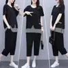 Nuevo traje de verano para mujer talla grande Adelgazante Holgado Moda Elegante Rayas Camiseta de manga corta Pantalones de nueve cuartos Conjunto de dos piezas