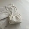 Bolso de hombro para mujer, simple y versátil, estilo coreano de nicho 2026, suave bolso de axila de color liso plisado, bolso de mano simple