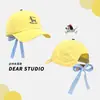 Boné de Baseball com Laço em Xadrez Estilo Coreano e Bordado de Cachorro Fofo para Mulheres, Novo Design Versátil Que Faz o Rosto Parecer Menor