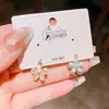Moda de Verano Elegantes Simples de Doble Uso Cat-Eye Flor de Esmalte Pendientes Clip para Orejas para Mujeres con un Toque de Alta Gama