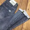 Calça Jeans Masculina Azul-Cinza para Primavera e Outono, Resistente a Manchas, Estilo Coreano Moderno, Calça Versátil de Moda Slim Fit Atacado
