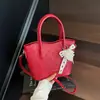 Bolso de Mano para Mujer 2025 Nuevo Rojo Bolso de Boda Bolso de Hombro Único Cruzado Bolso Cubo de Moda Coreana de Nicho Bolso de Dama de Honor