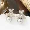Pendientes de Perla Mariposa Moda Europea y Americana Pendientes Elegantes de Hada Aguja de Plata de Ley 925 Pendientes Exquisitos de Gama Alta de Lujo Ligero para Mujer