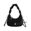 Bolso cruzado de nicho estilo coreano 2026 Primavera Nuevo Versátil Lazo Plisado Ins Bolso tipo dumpling de diseñador para mujer