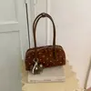 Bolsa de Lona com Bolinhas 2026 Nova Bolsa Boston Versátil para o Dia a Dia Feminina Estilo Doce Coreano Bolsa de Ombro Único Transversal