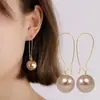 Brincos de Argola Grande com Bola de Pérola Estilo Novo 2026 Estilo Europeu e Americano Longo com Franjas Personalidade Versátil Tendência Brincos para Mulheres