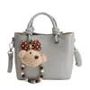 Bolso de Mano de Lujo con Textura de Patrón Lichi, Bolso Cubo para Mujer, Nuevo Estilo Primavera Temprana 2026, Simple y Versátil, Bolso de Hombro y Cruzado Exquisito