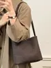 Bolso de Cubo Tejido Retro Transfronterizo para Mujer 2026 Otoño Nuevo Simple de Nicho para Viajar al Trabajo Bolso de Hombro Bajo el Brazo