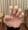 Las uñas cortas y portátiles más vendidas de Xiaohongshu: Puntas de Uñas Ojo de Gato con Lunares, Uñas Postizas Frescas y Lindas