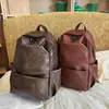 Mochila Atacado Transfronteiriço PU Moda Retrô Cor Sólida Grande Capacidade para Homens e Mulheres, Mochila Tendência para Viagens de Curta Distância, Bolsa para Computador