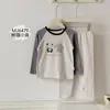 Conjunto de Pijama Infantil con Estampado Completo de Conejo de Pan Otoño 2026, Nuevo Modelo Otoño-Invierno, Conjunto de Top y Pantalones de Lycra Clase A con Cuello Redondo