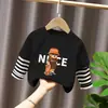 Camiseta de manga larga de algodón puro para niño 2026 primavera y otoño nueva elegante de dibujos animados estilo dos piezas falsas camiseta base de primavera para niño