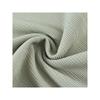 Keqiao tela al por mayor nuevo poliéster amoníaco jacquard tejido cárdigan de mujer tejido jacquard de canalé