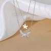 Collar de doble capa con circonita y flor de mariposa para mujer, nuevo diseño de nicho de lujo ligero 925, cadena de clavícula sencilla y elegante.