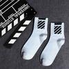 Calcetines de otoño e invierno para mujer hasta media pantorrilla blanco y negro estilo campus NY calcetines para pareja barras paralelas letras running hip hop media pantorrilla Deportes calcetines para hombre