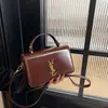 Bolsa de Ombro Transversal Versátil Texturizada de Nicho Nova Primavera/Verão 2026 Bolsa de Axila Vintage Bolsa Feminina de Comércio Exterior