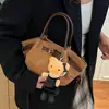 Bolso de Diseño de Nicho de Gama Alta para Mujer Otoño 2026 Nueva Moda Versátil Bolso Cubo Simple Bolso de Hombro Cruzado