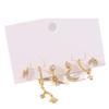 Pendientes de lujo con incrustaciones de circonitas y luna y estrella para mujer, de latón chapado en oro auténtico, de venta caliente, transfronterizos europeos y americanos