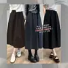 ¡Contrarresta el pedido! ¡Falda de botón tridimensional estilo Hepburn! Tela de lana europea otoño e invierno falda larga elegante para mujer