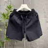 Nuevos Shorts Deportivos de Color Sólido para Hombre Estilo Americano Holgado Verano 2026 Pantalones de Chándal Versátiles de Pierna Recta de Moda para Pareja