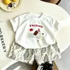 Nuevo conjunto de verano de manga corta para niños, conjunto casual de moda de dos piezas con shorts de manga corta de perro de dibujos animados para niños y niñas