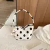 Bolsa balde de bolinhas da moda popular deste ano 2026 nova bolsa de mão de urso fofa bolsa feminina de nicho com temperamento bolsa de ombro