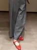 Pantalones de traje grises de alta gama, estilo francés sofisticado para el trabajo, principios de otoño de 2026, estilo europeo súper popular, muy elegantes, para figura de pera, pantalones de pierna ancha que disimulan las caderas