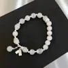 Pulsera de la suerte y auspiciosa de nuevo estilo, fresca y elegante, estilo refrescante, pulsera de borla que trae suerte, versátil para mujeres artísticas