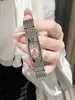 Relógio Pulseira AIMANA Fashion Tendência, Relógio Feminino de Quartzo High-End de Nicho, Relógio Pequeno Dourado Simples Retrô Atacado