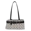 Bolsa de ombro feminina com design único 2026 nova bolsa vintage com fivela de cinto para sob o braço para mulheres, bolsa estilosa de motociclista, bolsa baguette