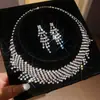 Aretes y collar de dos piezas con colgante de flor y gota de agua incrustados con diamantes, cadena para la clavícula de moda y exquisita, joyería de lujo ligero y de alta gama para mujer