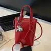 Bolso Pequeño Retro para Mujer Verano 2025 Nueva Moda Bolso Cubo de Gama Alta Versátil Cruzado para Teléfono Móvil Bolso de Hombro