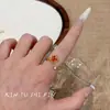 Otoño e Invierno Nuevo Anillo Retro de Zircón Rojo Hoja de Arce para Mujer Dulce Sentido de Alta Gama Exquisito Anillo Abierto Combinable
