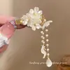 "Gota de Orquídea" Nuevo Pasador de Flor de Lirio del Valle Estilo Chino para Mujer, Accesorio para el Cabello con Borla Estilo Antiguo, Pin de Pato