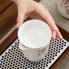 Tetera de Jade Blanco de Alta Gama Dehua Flor de Glicina Juego de Té Kung Fu Hogar Negocio Recepción Preparación de Té Set de Porcelana Blanca Cultural y Creativo