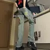 Vibras estilo americano, jeans de pierna curva para hombre, invierno, alta costura, corte limpio, azul retro, ligeramente acampanados, adelgazantes y forrados de felpa