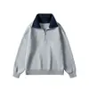 Suéter de solapa estilo americano para hombre, otoño e invierno 2026, tejido base de punto de cuello alto con media cremallera, suéter tipo chaqueta de alta gama