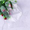Guantes de plástico transparente desechables, resistentes al aceite y a los alimentos, para salones de belleza, uso doméstico y catering.