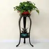Soporte de flores de hierro forjado, estilo europeo, de pie, estante para macetas de interior de varios niveles para sala de estar y balcón, adecuado para plantas en maceta como plantas araña y plantas en maceta.