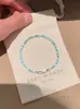 Pulsera de circonita multicolor de lujo ligero para comercio exterior europeo y americano, deslumbrante con incrustaciones de diamantes, a la moda, simple, elegante, joyería de alta gama al por mayor