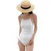 Nuevo traje de baño estilo coreano 2026 para mujer, con un diseño sofisticado, un escote halter apto para busto pequeño, un color liso sencillo y un estilo de una sola pieza con un toque de elegancia seductora