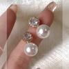 Nuevos pendientes de perla con aguja de plata que combinan con todo, pendientes sencillos de gran sentido, pendientes de lujo ligeros franceses de celebridades de Internet del mismo estilo para mujeres