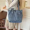 Bolsa Tote Casual Simples Versátil Lavada de Grande Capacidade com Alça Única 2026 Bolsa Jeans Artística Feminina Popular Novo Estilo Bolsa da Moda