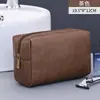 Bolsa de almacenamiento de artículos de tocador de cuero PU de alta gama transfronteriza, organizador multifuncional para productos de lavado y cuidado de viaje, bolsa de maquillaje de mano