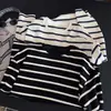 Camiseta Básica de Punto Rayado para Mujer Otoño Temprano 2026, Corte Holgado, Cuello Redondo, Casual, Versátil, Suave y Cómoda, Manga Larga para Mujer