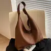 Bolsa feminina de grande capacidade, novo estilo de verão 2026, de alta qualidade, nicho, adequada para a faculdade e o trabalho, bolsa tote versátil de ombro