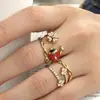 Anillo de dedo índice de flor de cuatro pétalos de insecto Mili de nicho con índice de circonita incrustada, color acero inoxidable, anillo de joyería de moda personalizado para mujer